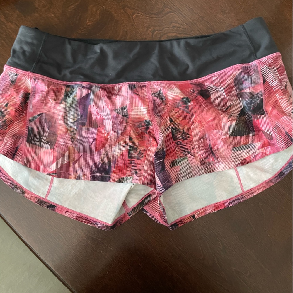 Red print lulu shorts.